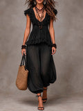 Top in pizzo scollo a V bohémien nero e pantaloni Harem coordinati