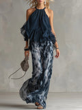 Eleonora | Top con collo halter blu navy e pantaloni larghi stampati in chiffon