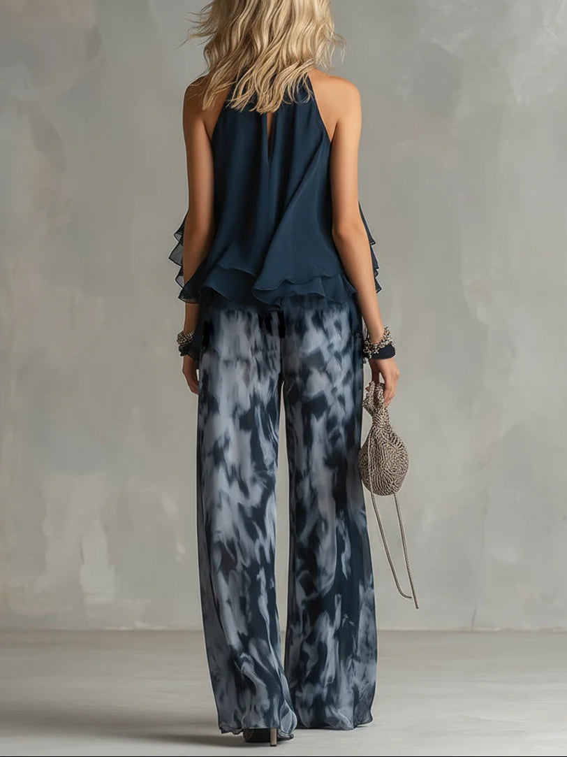 Eleonora | Top con collo halter blu navy e pantaloni larghi stampati in chiffon