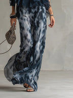 Eleonora | Top con collo halter blu navy e pantaloni larghi stampati in chiffon