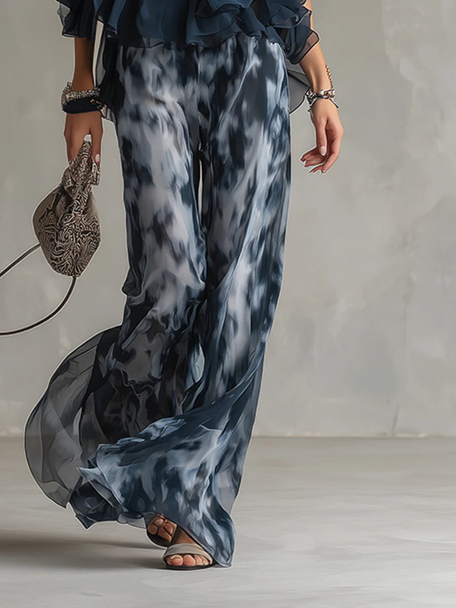 Eleonora | Top con collo halter blu navy e pantaloni larghi stampati in chiffon
