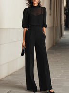 Completo di tre pezzi: top in chiffon nero trasparente e pantaloni a gamba larga