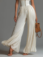 Nadia | Tuta in Chiffon Bianco Senza Maniche con Zip e Pieghe a Gamba Larga