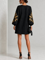 Abito Mini Nero in Stile Loose con Collo a Giro e Maniche a Lanterna