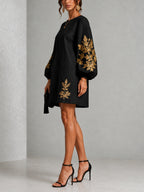 Abito Mini Nero in Stile Loose con Collo a Giro e Maniche a Lanterna