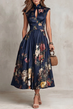 Benedetta | Abito Midi in Satin Floreale Nero con Collo a Chiave e Pieghe